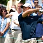 Golfer Anthony Kim tees off on the first tee