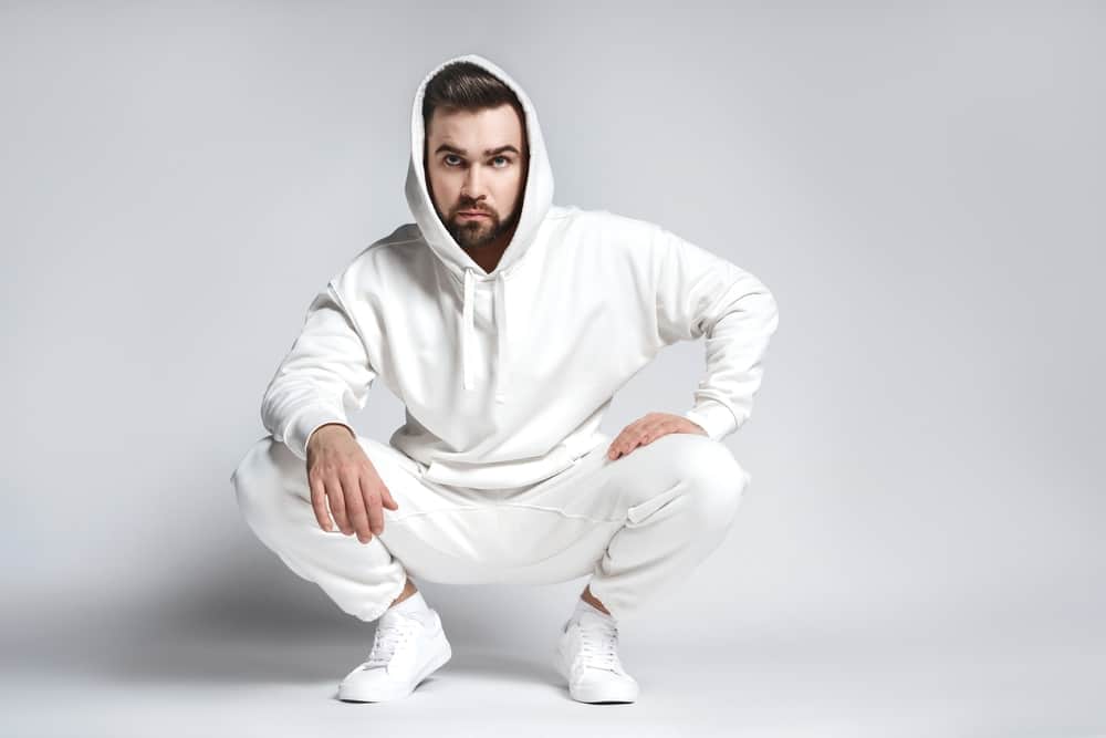 man wearing blank white hoodie and pants