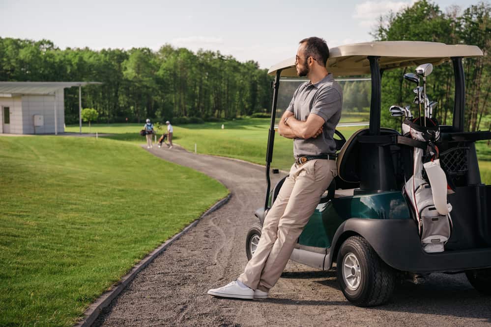 Golf player spend time at golf course